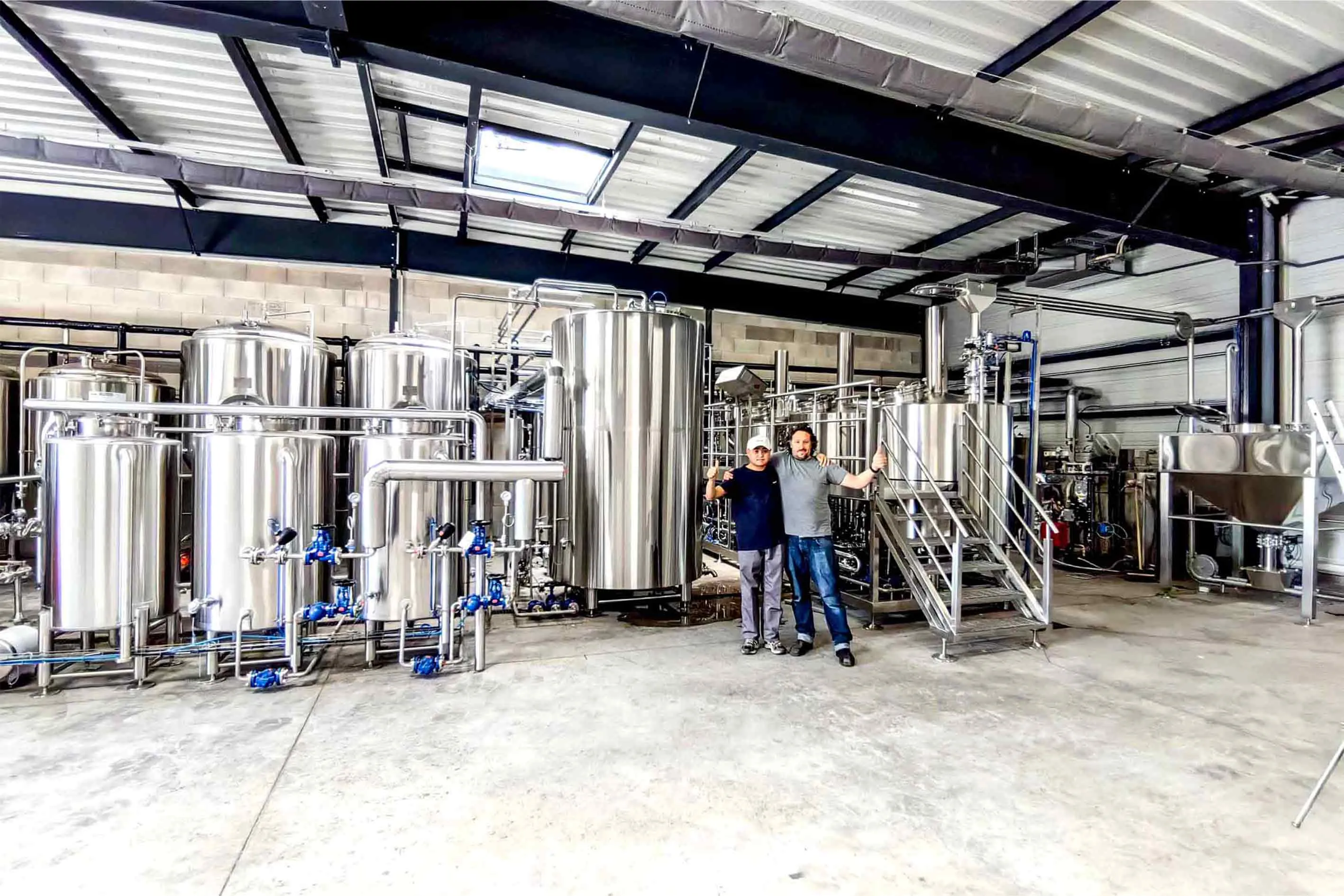 Satisfied international clients with Zeyu brewery project completion