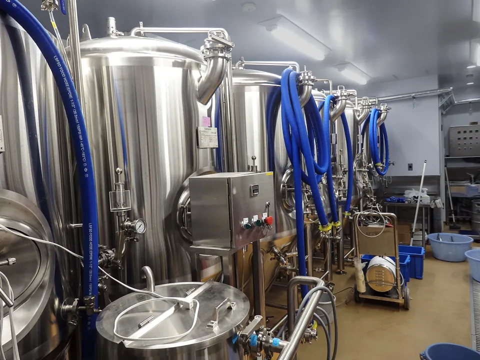 Brewmaster operating 700L brewery equipment at A Route