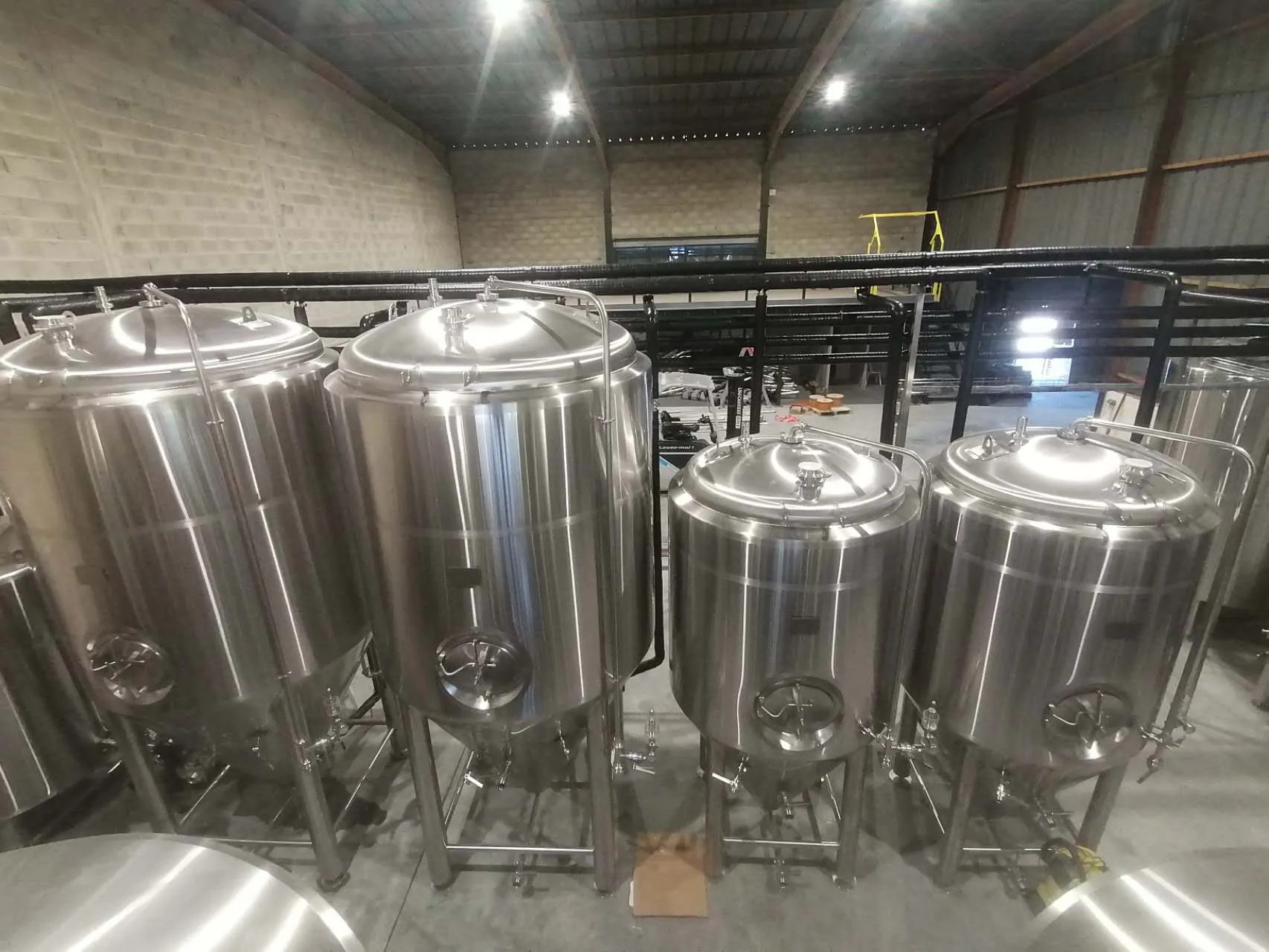 Stainless steel fermentation tanks at Brasserie L'Amista 25HL brewery
