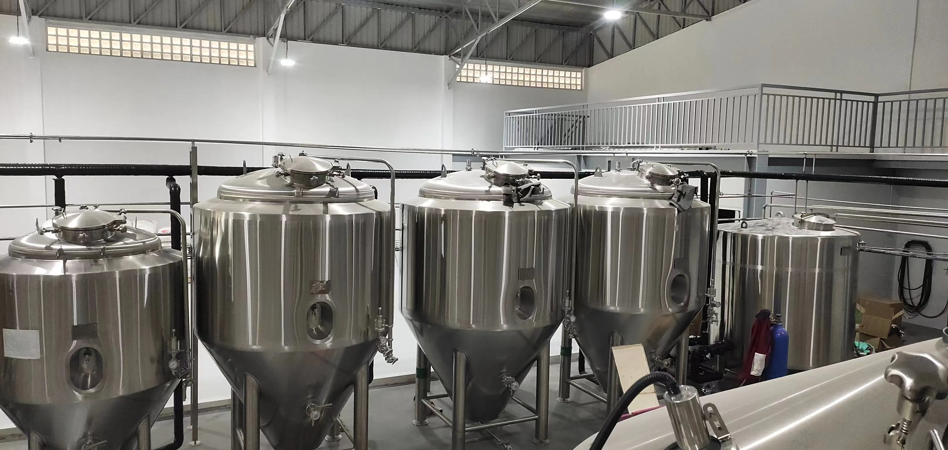 10HL mash lauter tun and kettle whirlpool vessels at craft brewery