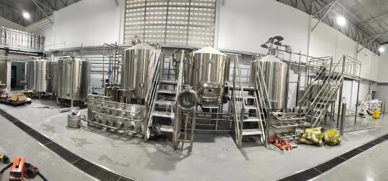 Brewmaster operating 10HL brewery equipment at GRAND DIAMOND BREWERY