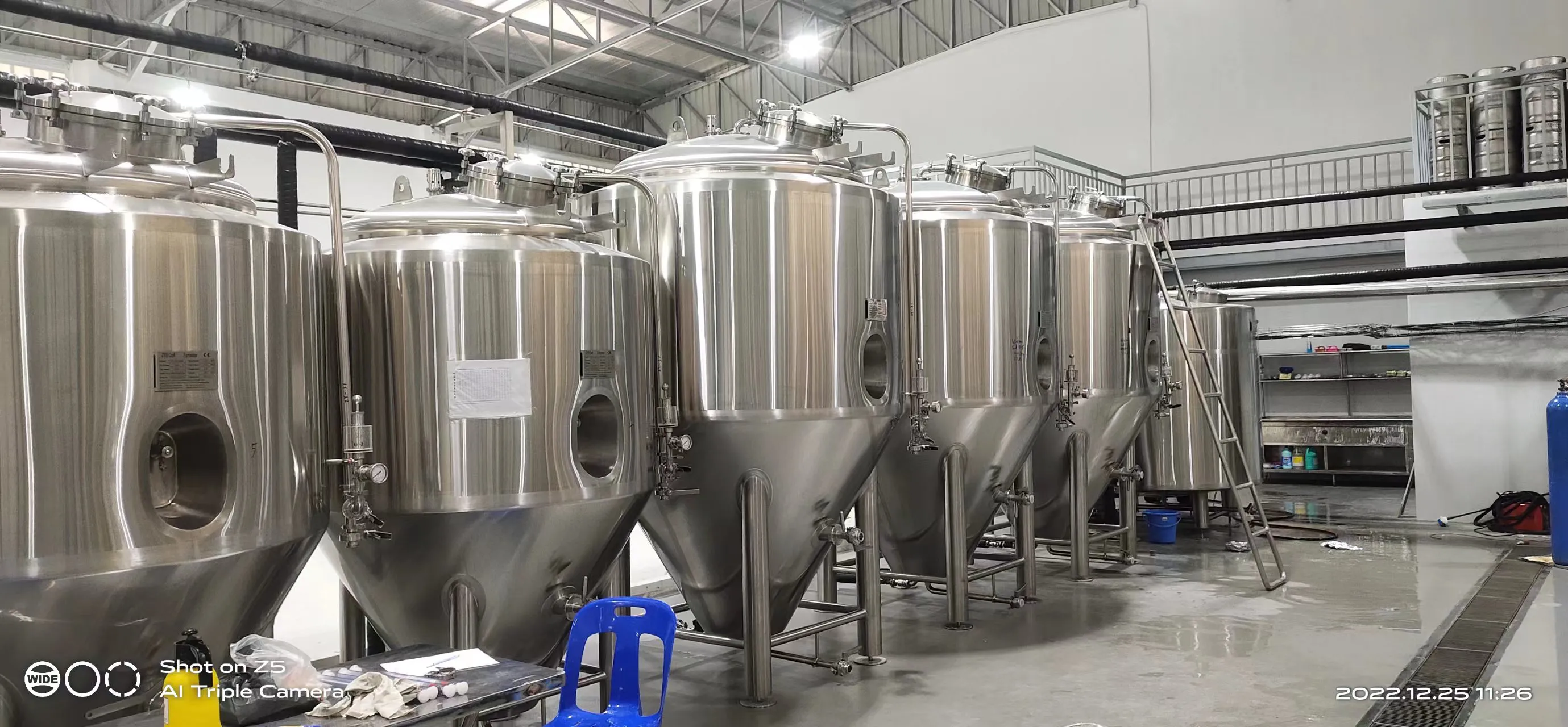 Stainless steel fermentation tanks at GRAND DIAMOND BREWERY 10HL brewery