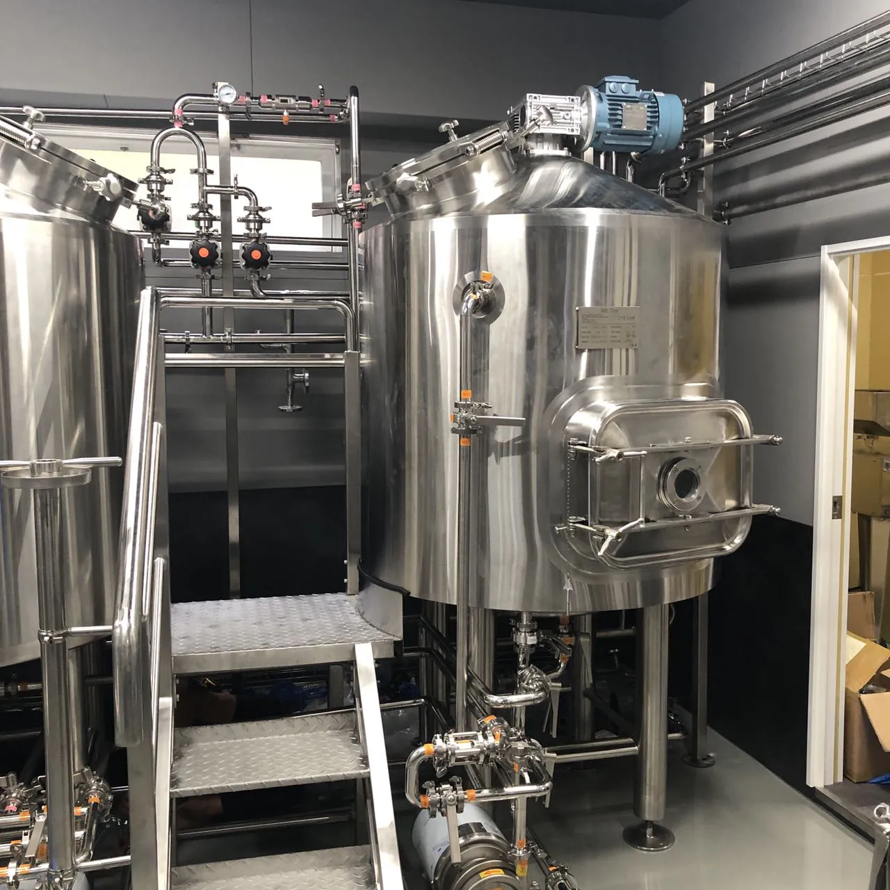 Brewmaster operating 3.5BBL brewery equipment at HAZY LABO