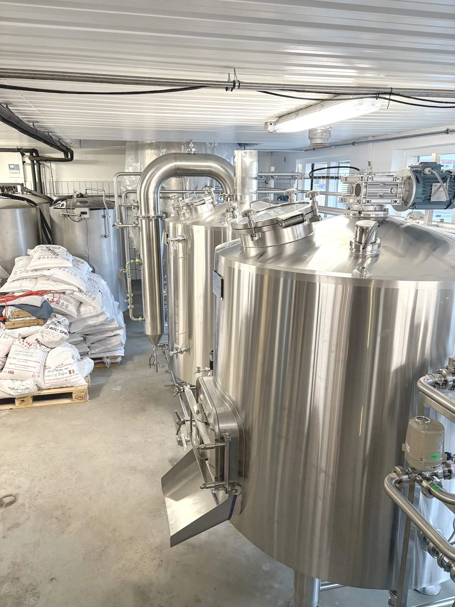 Stainless steel fermentation tanks at Hvide Sande Bryghus 10HL brewery