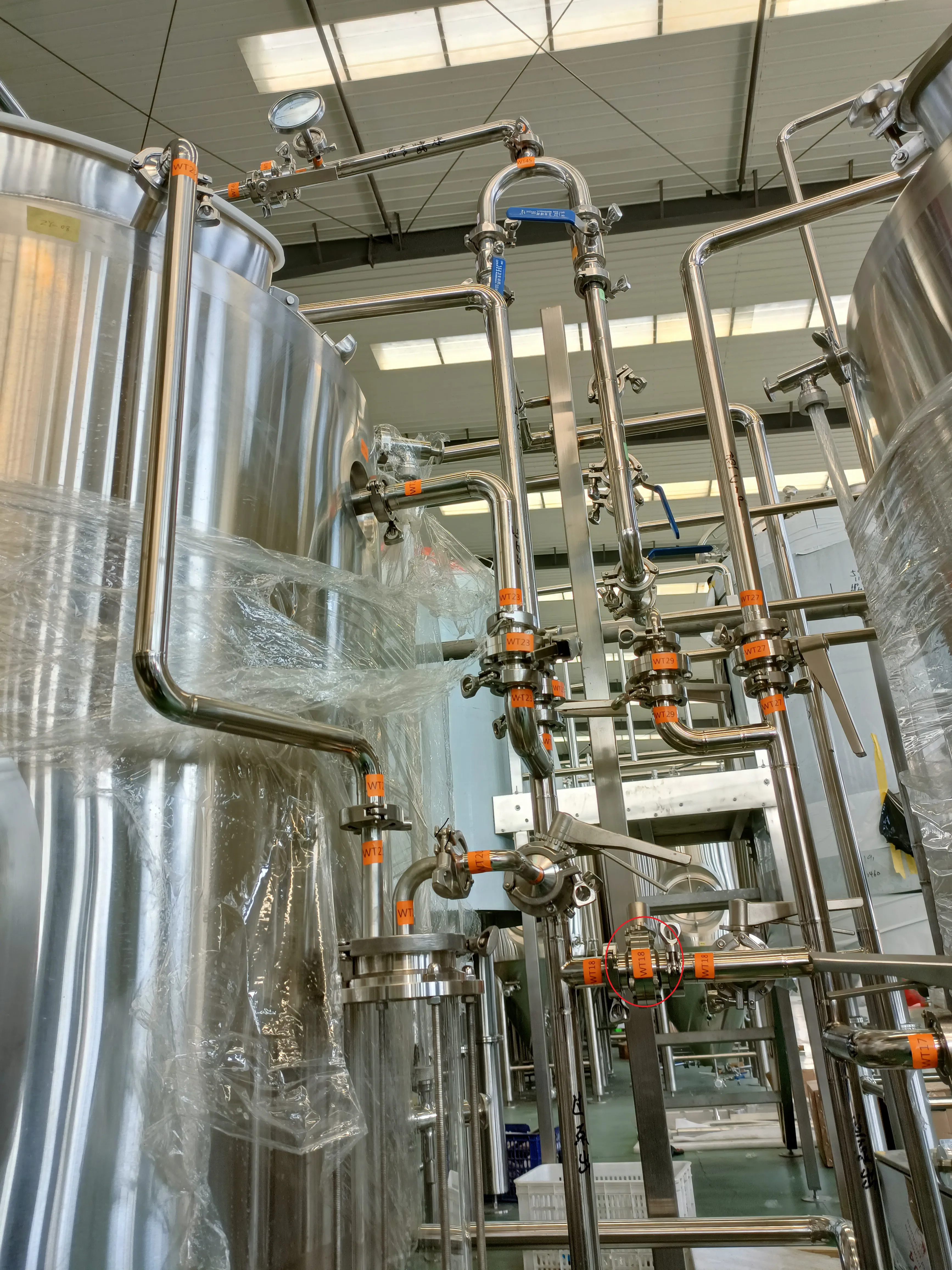 Stainless steel fermentation tanks at Kichi LLC 2BBL brewery