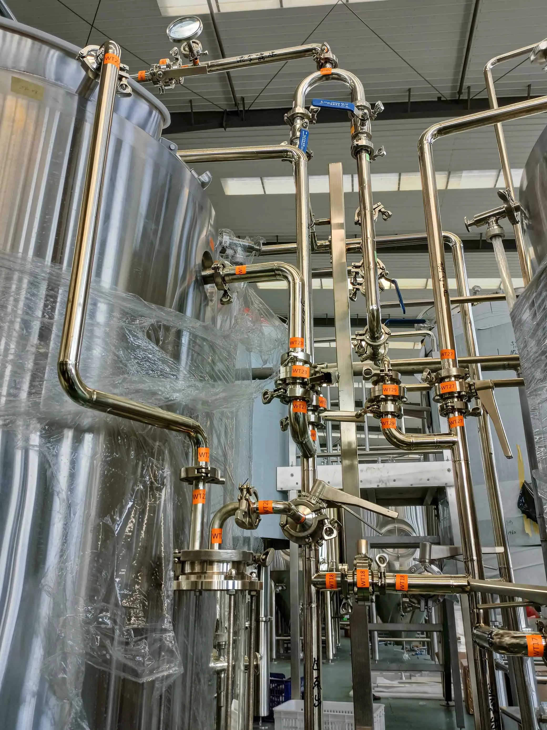 Brewmaster operating 2BBL brewery equipment at Kichi LLC
