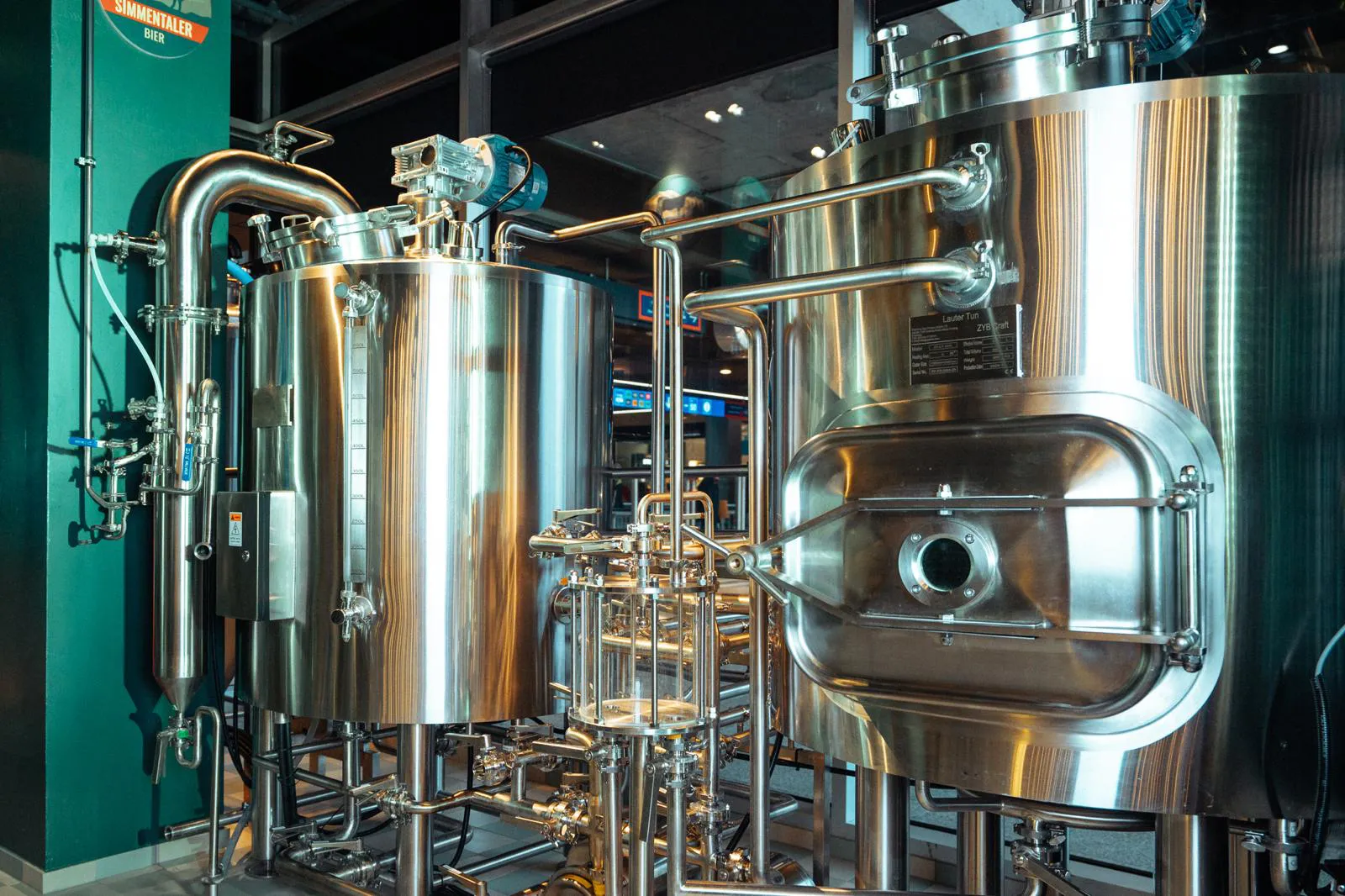 Brewmaster operating 400L brewery equipment at Simmentaler Braumanufaktur