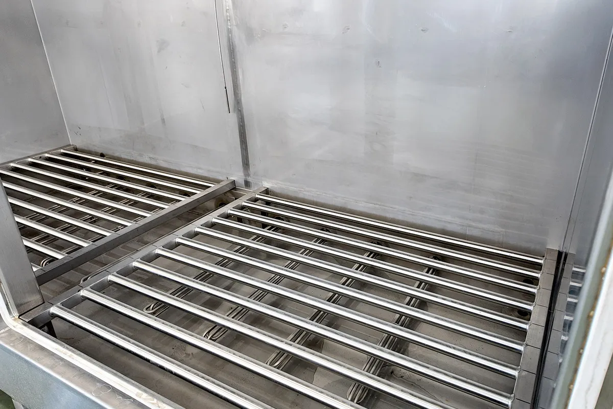 Side view of dual pallet industrial pasteurizer machine