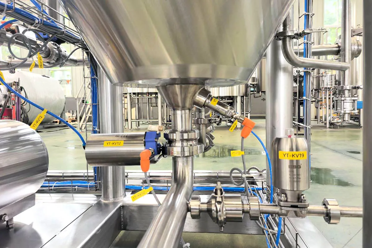 Sanitary stainless steel yeast assimilation system for commercial breweries