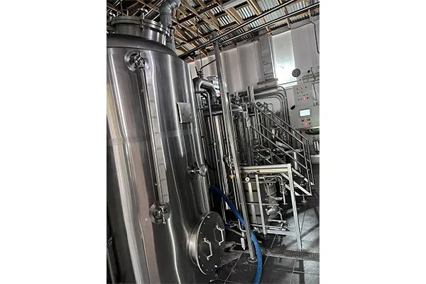 Fully assembled brewery brewhouse & fermentation tanks at Nevis Peak Brewery site